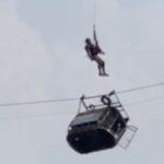 8 People Rescued From Dangling Cable Car